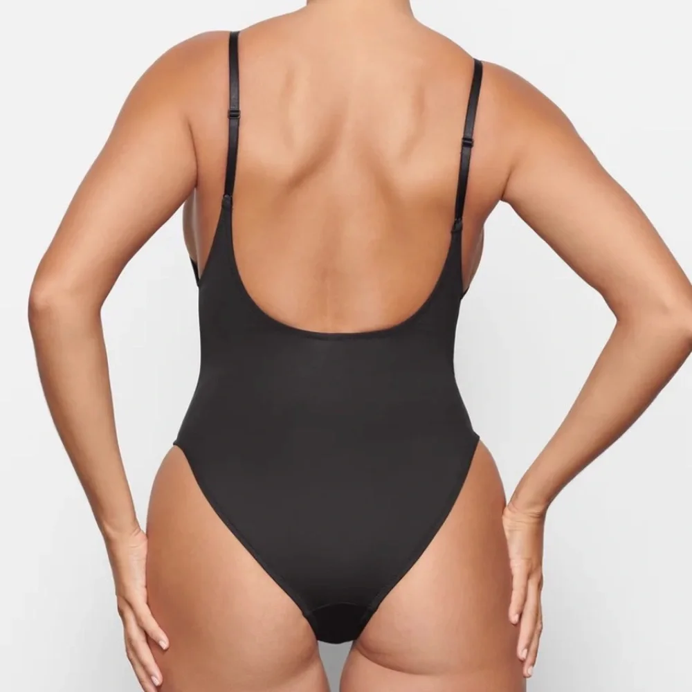 NWT- Skims. Recycled swim. Scoop neck‎ one piece. Onyx/Black.